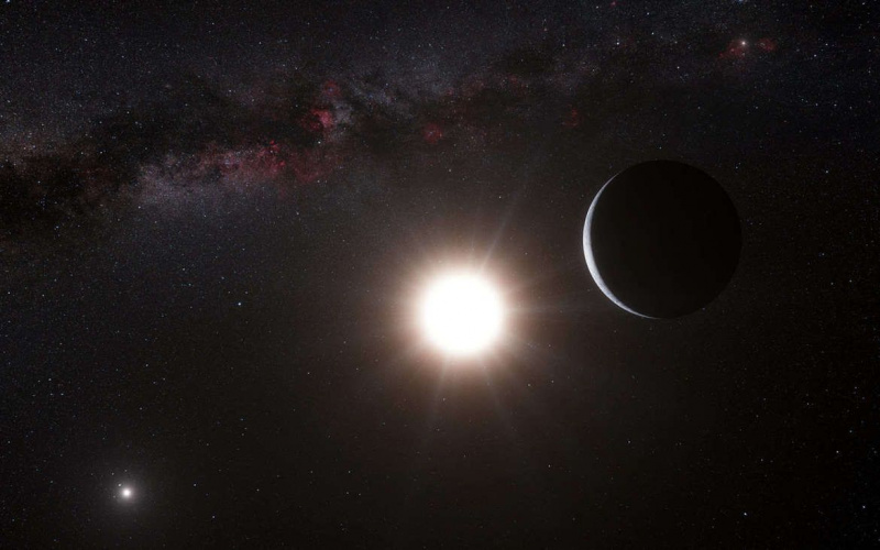 Oeuvre représentant une exoplanète en orbite autour de l'une des deux étoiles composant l'Alpha Centauri binaire. Crédit : ESO/L. Calçada/Nick Risinger (skysurvey.org)