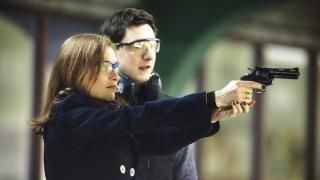 Elle Movie: Michele skyder en pistol med Patrick