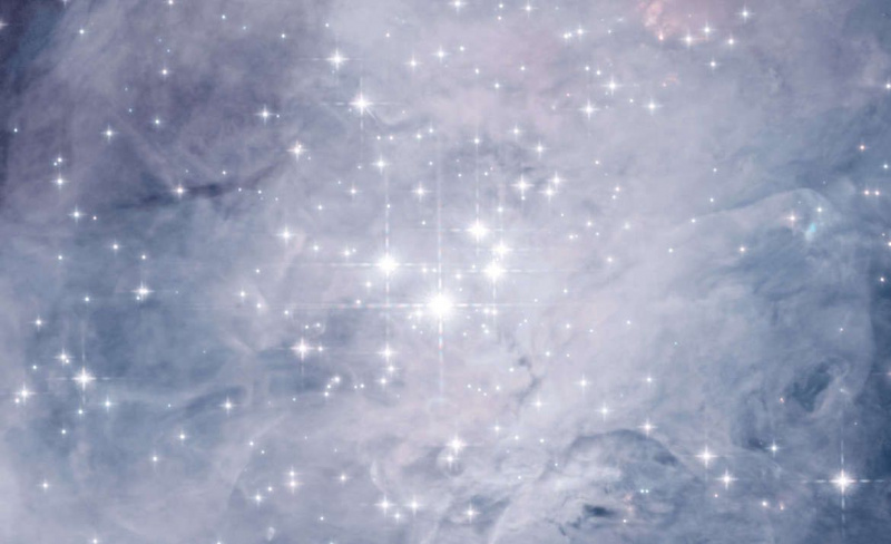 O Trapézio, quatro estrelas massivas e luminosas no coração da Nebulosa de Órion. Crédito: NASA / ESA / Massimo Robberto / Judy Schmidt