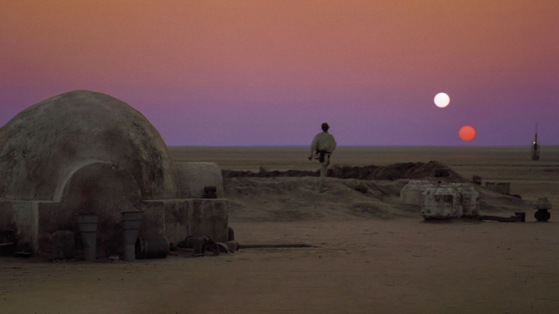 Um pôr do sol binário em Tatooine. Há muita ciência escondida nesta cena. Crédito: Disney / Lucasfilm